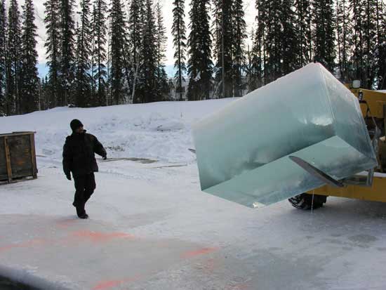 Strachan alongside his ice block in Alaska (photo courtesy the artist and Pierogi2000 Gallery)